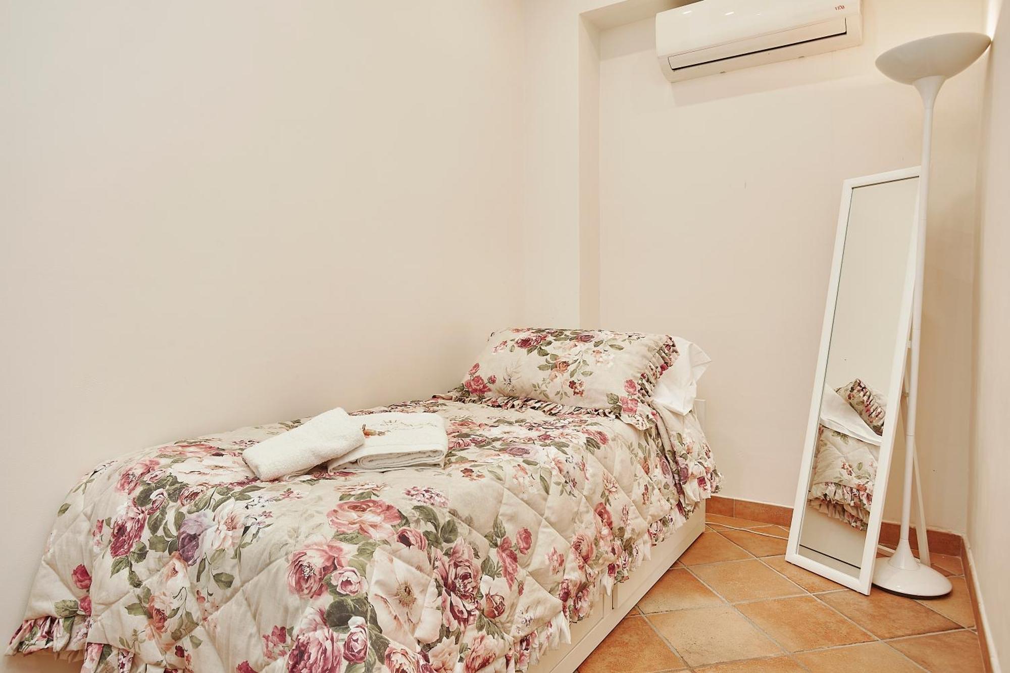 Quarto em Acomodações Particulares Laura
